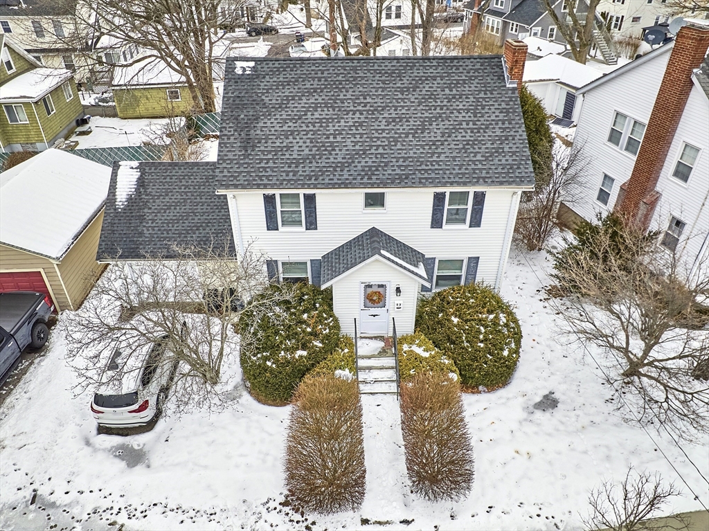 53 Wallace Road Quincy, MA 02169 - Photo 1 of 28 a front view of a house with a yard