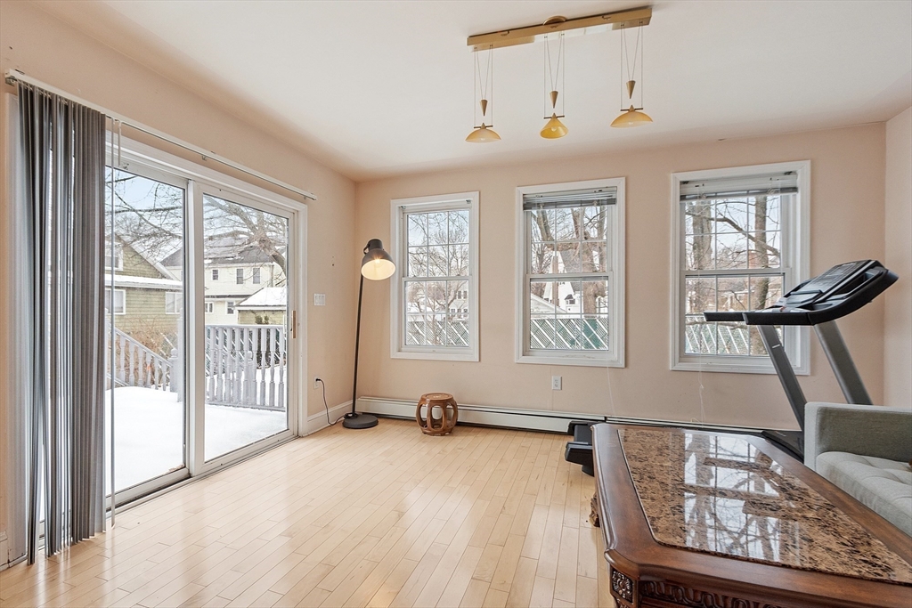 53 Wallace Road Quincy, MA 02169 - Photo 13 of 28 a view of livingroom with furniture wooden floor and windows