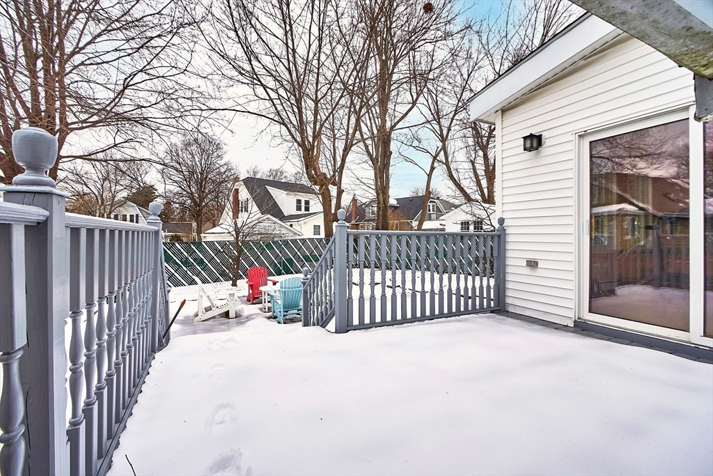 53 Wallace Road Quincy, MA 02169 - Photo 16 of 28 a view of a porch with a bench