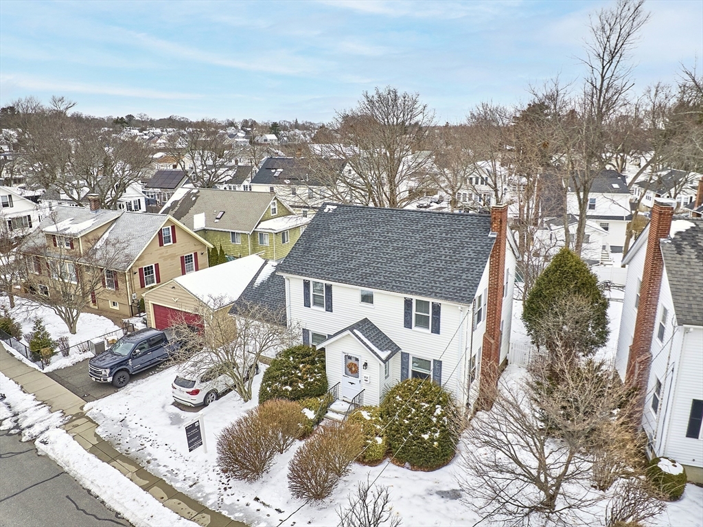 53 Wallace Road Quincy, MA 02169 - Photo 2 of 28 an aerial view of a house with a mountain