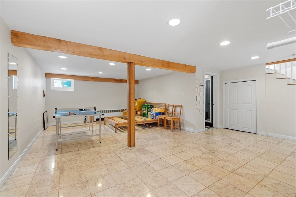 53 Wallace Road Quincy, MA 02169 - Photo 26 of 28 a view of a room with gym equipment