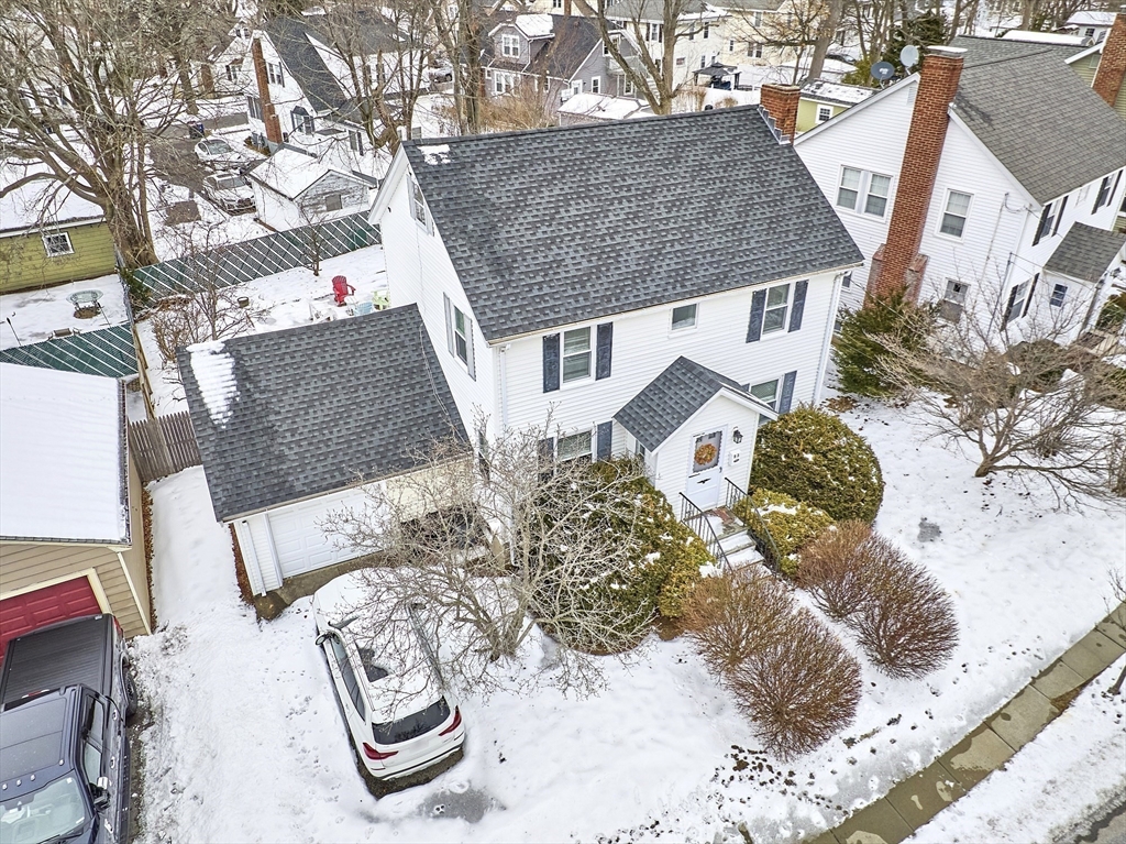 53 Wallace Road Quincy, MA 02169 - Photo 28 of 28 a view of a house with a yard