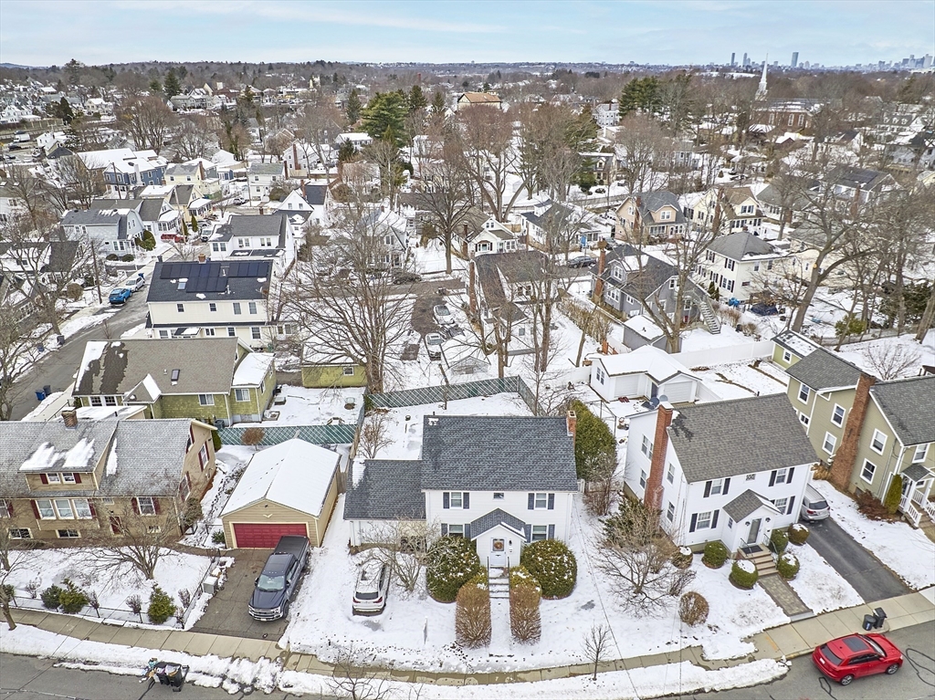 53 Wallace Road Quincy, MA 02169 - Photo 3 of 28 an aerial view of residential houses with outdoor space