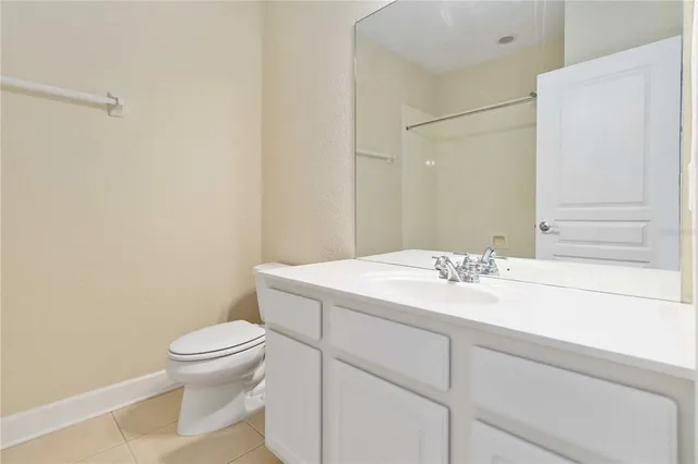 a bathroom with a shower and a bath tub
