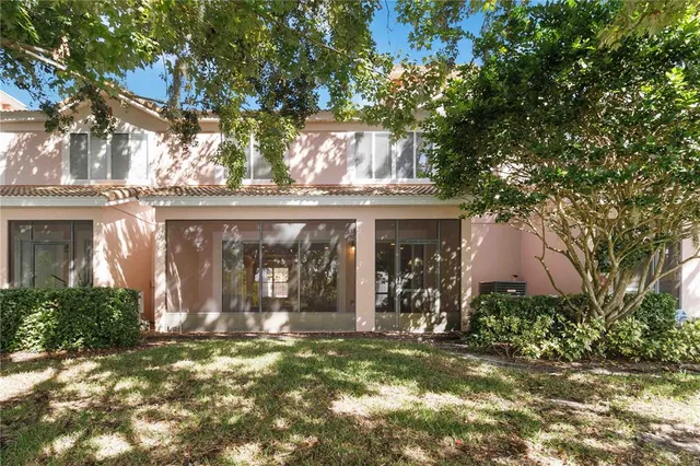 a view of a yard with a tree
