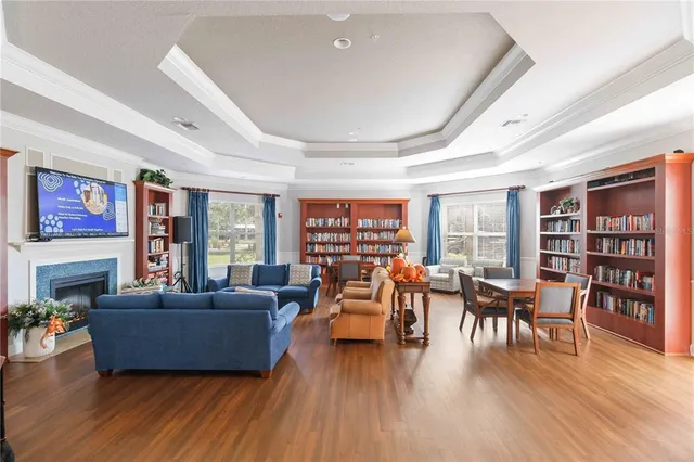 a room with lots of furniture and white walls