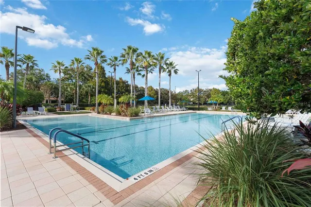 a view of outdoor space with garden and trees