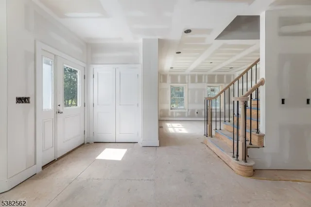 a view of an entryway with staircase