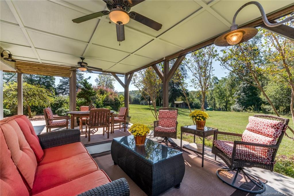 1588 McEntire Road Tryon, NC 28782 - Photo 16 of 27 a outdoor living space with patio furniture
