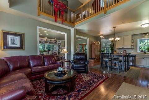 1588 McEntire Road Tryon, NC 28782 - Photo 3 of 27 a living room with furniture and a large window
