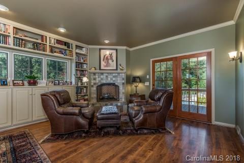 1588 McEntire Road Tryon, NC 28782 - Photo 7 of 27 a living room with furniture and a fireplace