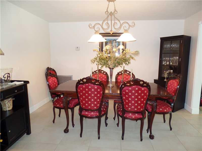 6230 Southwest 186th Way Southwest Ranches, FL 33332 - Photo 13 of 29 a view of a dining room with furniture and chandelier
