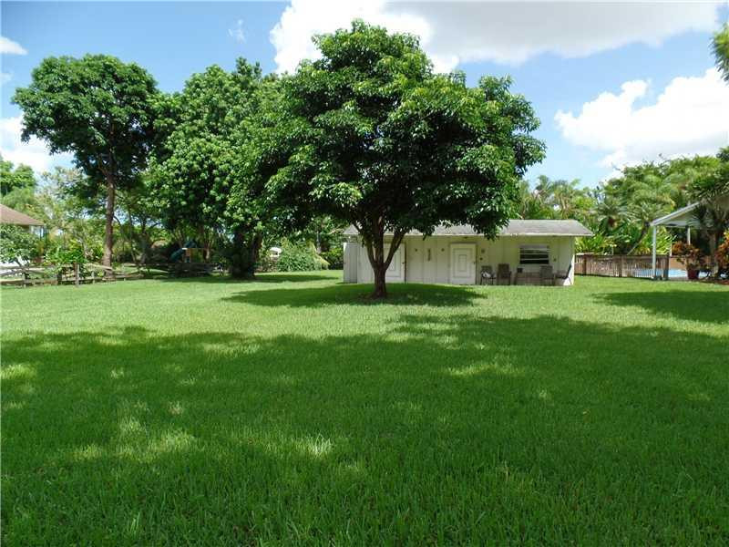 6230 Southwest 186th Way Southwest Ranches, FL 33332 - Photo 24 of 29 a view of a house with a big yard
