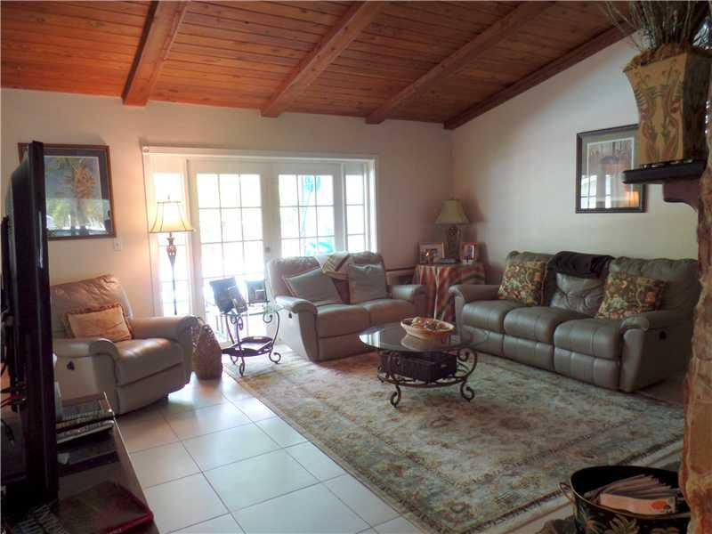 6230 Southwest 186th Way Southwest Ranches, FL 33332 - Photo 5 of 29 a living room with furniture and a large window