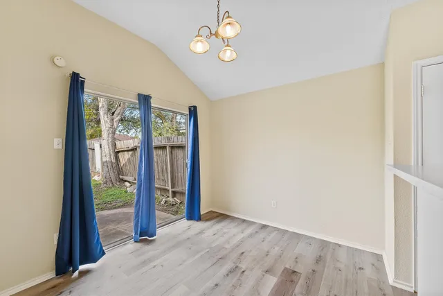 a view of an empty room with window