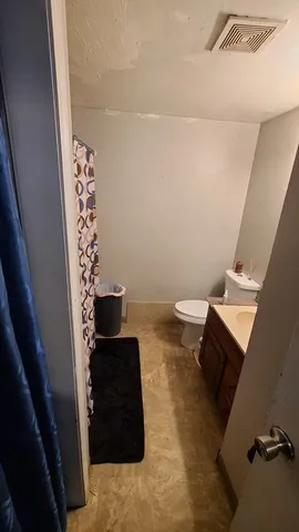 a bathroom with a sink and a toilet