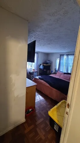 a living room with a couch and a flat screen tv