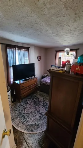 a kitchen with furniture and a sink