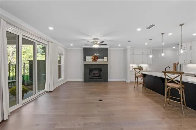 a view of a kitchen with a sink and cabinets