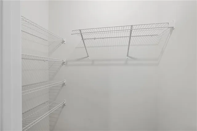 a view of a room with racks on the wall