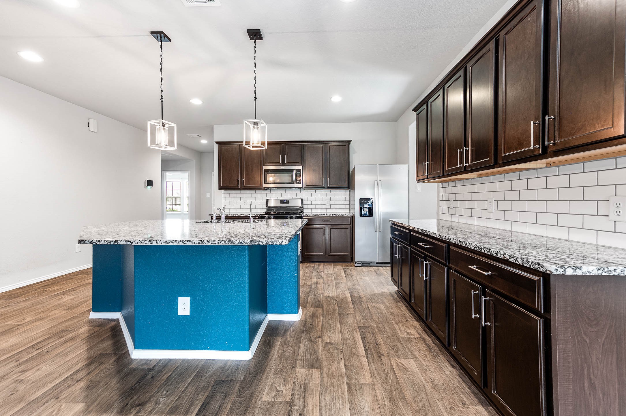 8402 Philox Park Rosharon, TX 77583 - Photo 9 of 37 Sleek Stainless Steel Appliances & Subway Tile Backsplash.