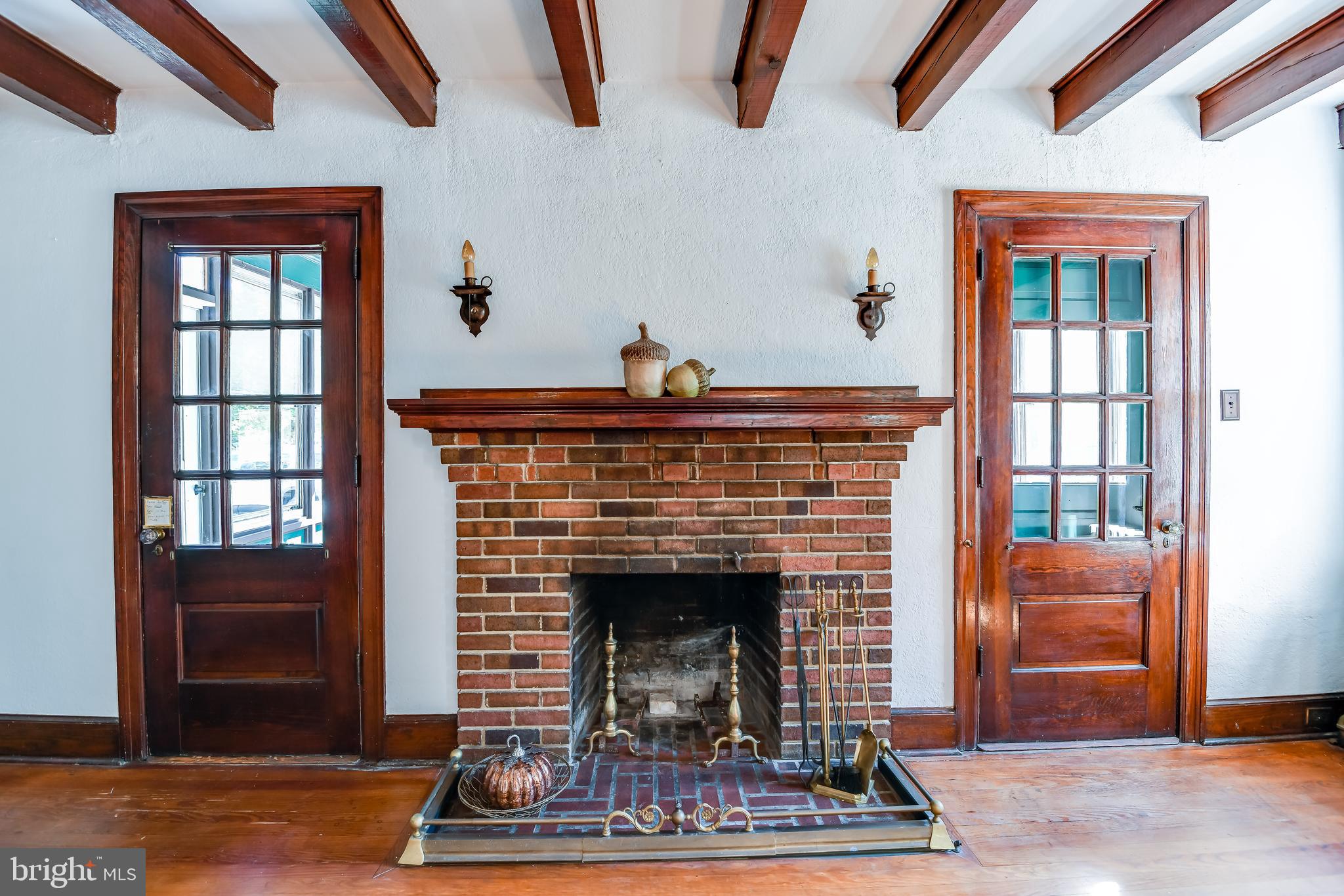 58 Elizabeth Street Pemberton, NJ 08068 - Photo 9 of 40 Fireplace with Doors that lead to Sun Porch