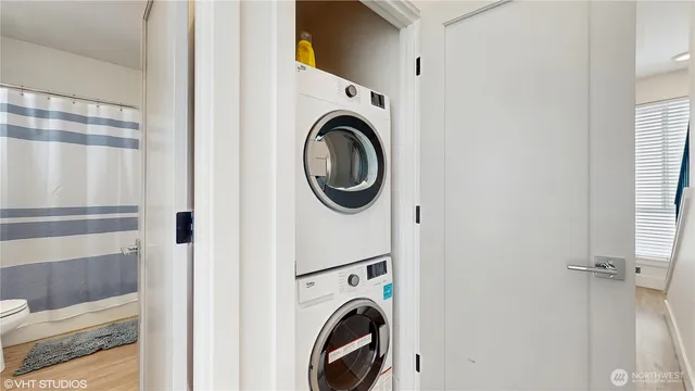 a utility room with dryer and washer