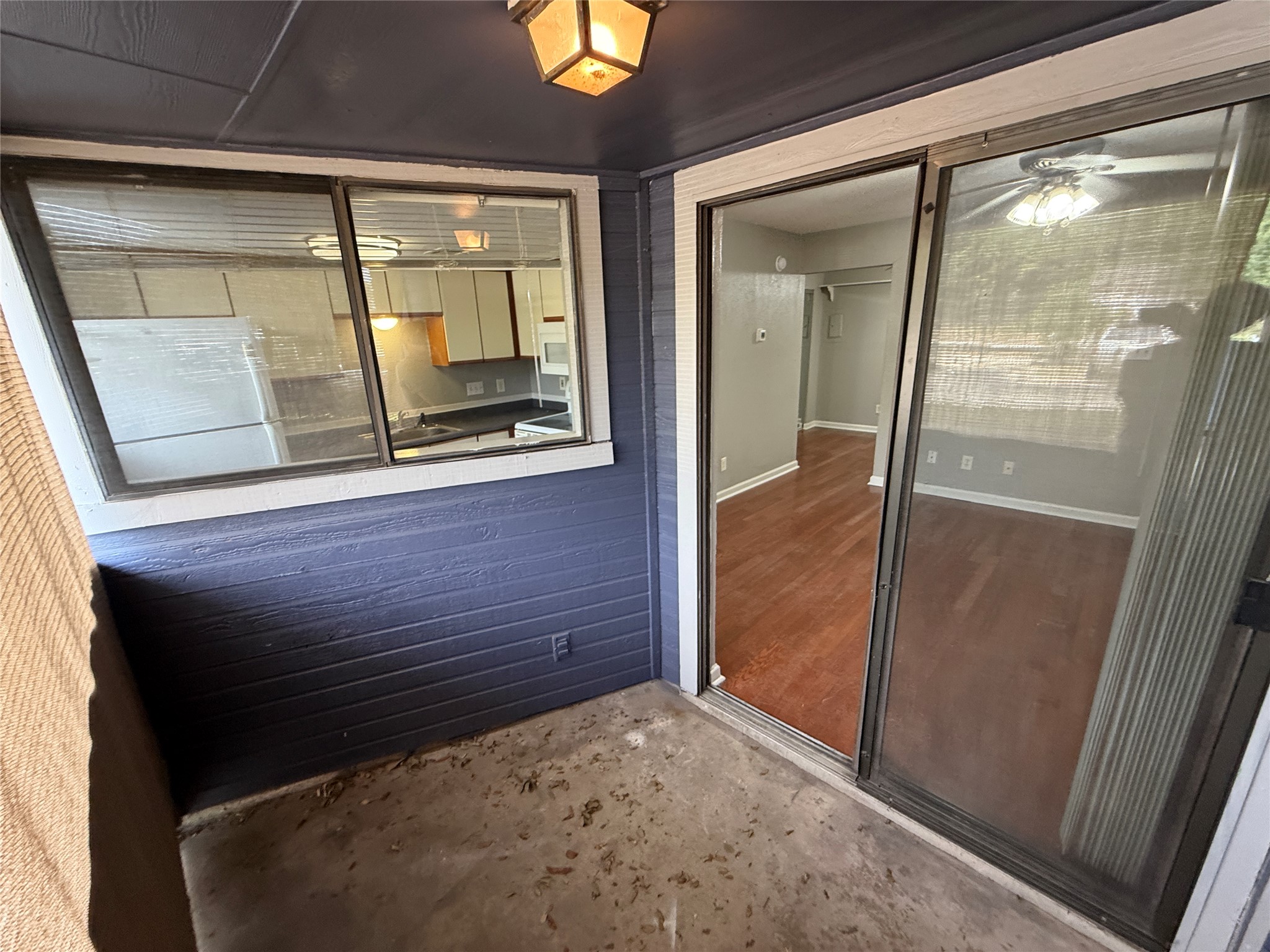 2500 Burleson Road, Unit 209 Austin, TX 78741 - Photo 9 of 15 Sliding glass doors connect the outdoor patio area directly to the interior living space.