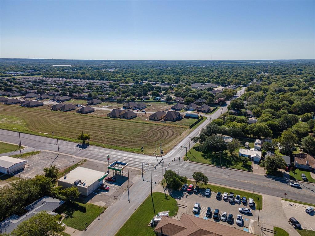 1 West Kilpatrick Street Cleburne, TX 76033 - Photo 4 of 4 an aerial view of a city
