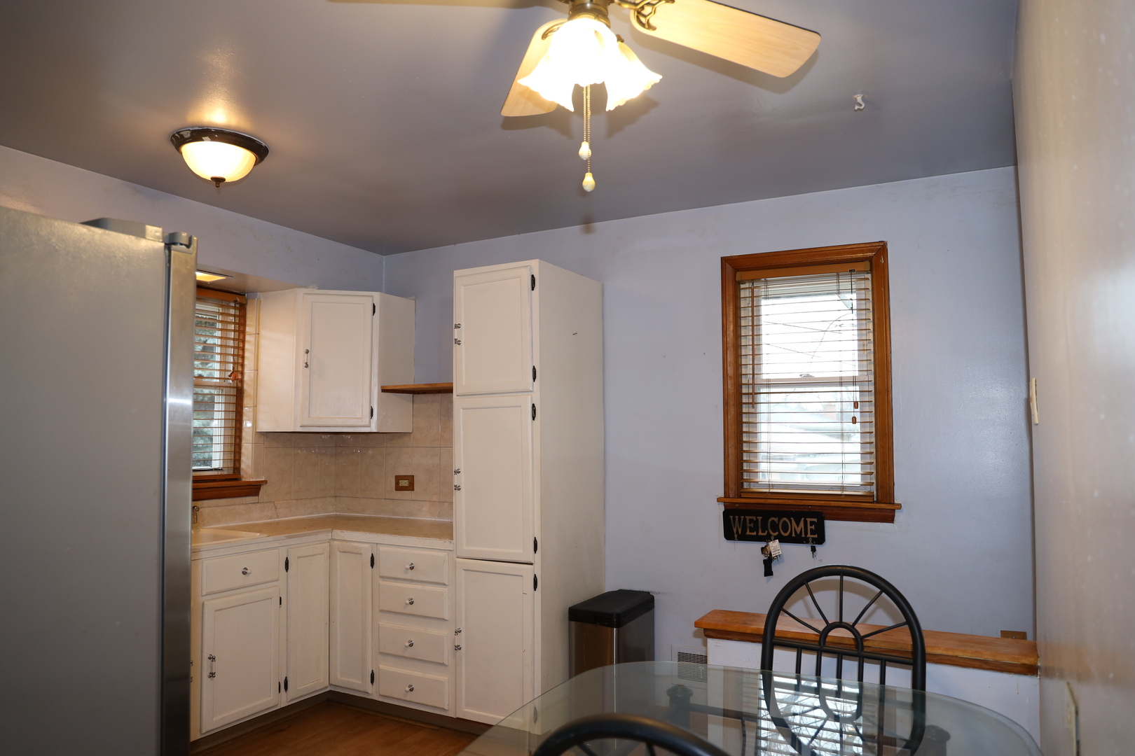 4641 Butterfield Road Hillside, IL 60162 - Photo 18 of 57 a kitchen with granite countertop a sink stainless steel appliances and window