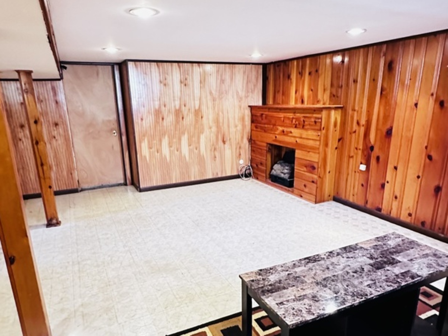 4641 Butterfield Road Hillside, IL 60162 - Photo 50 of 57 a view of a room with a fireplace and a large window