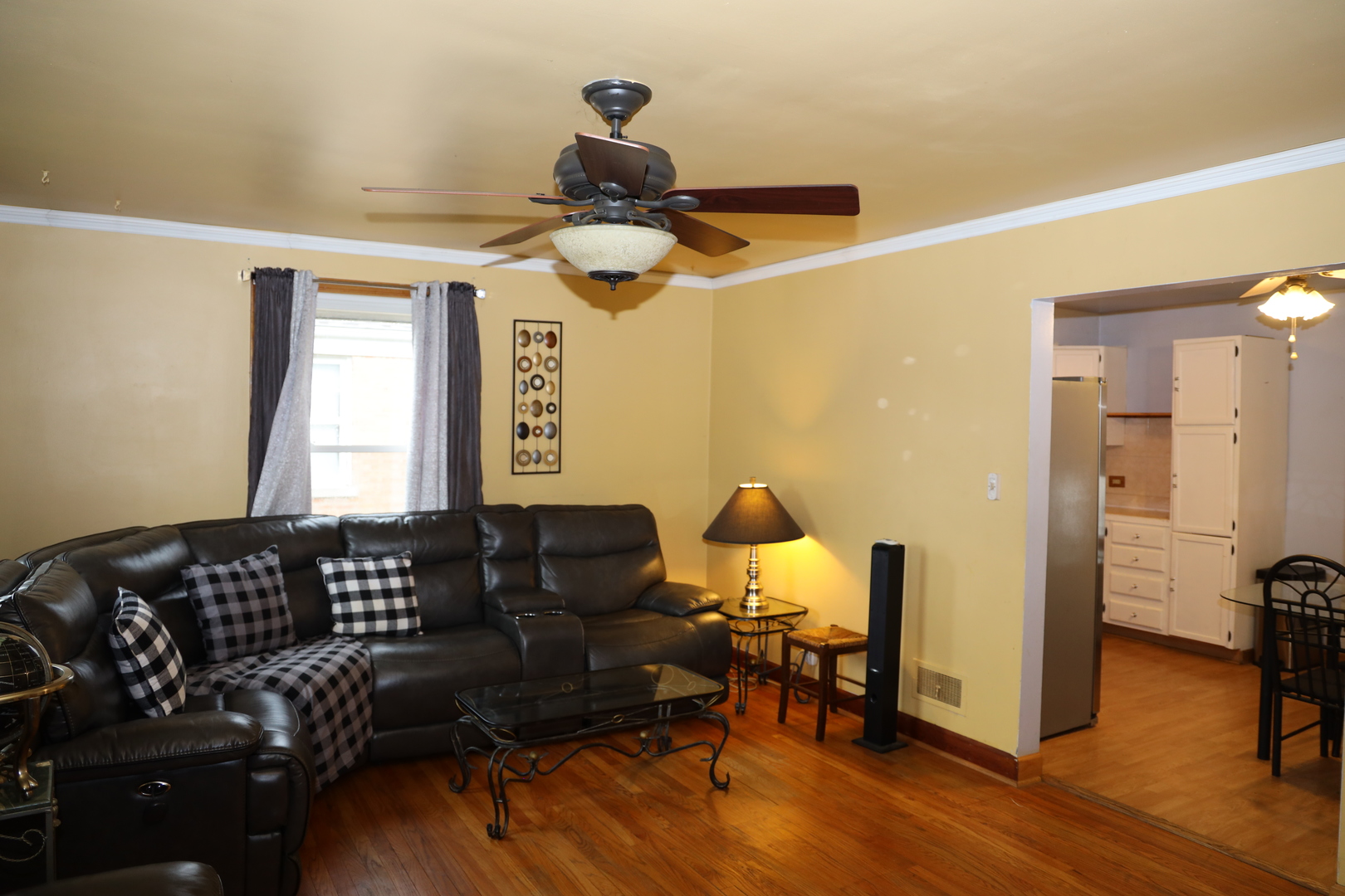 4641 Butterfield Road Hillside, IL 60162 - Photo 10 of 57 a living room with furniture and wooden floor