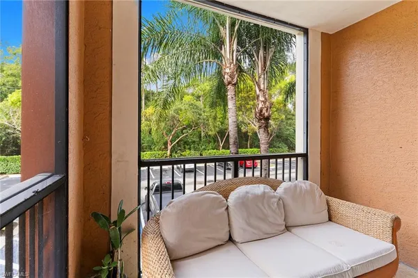 a balcony with a couch