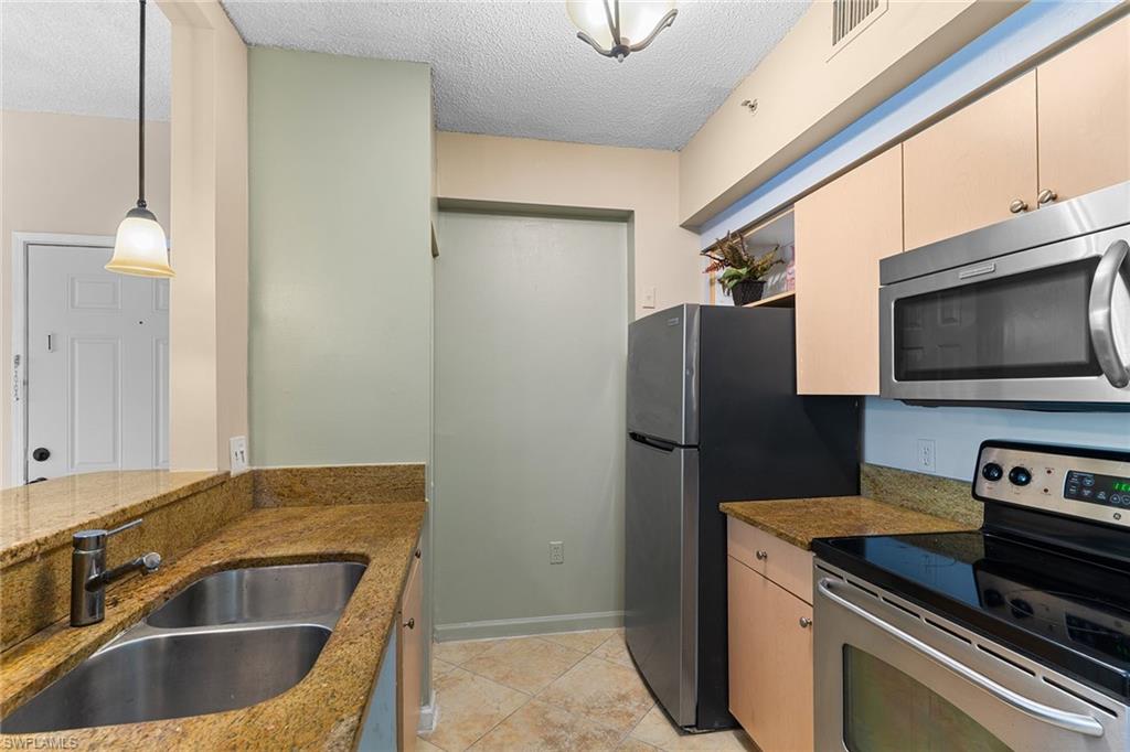 1170 Reserve Way, Unit 205 Naples, FL 34105 - Photo 9 of 22