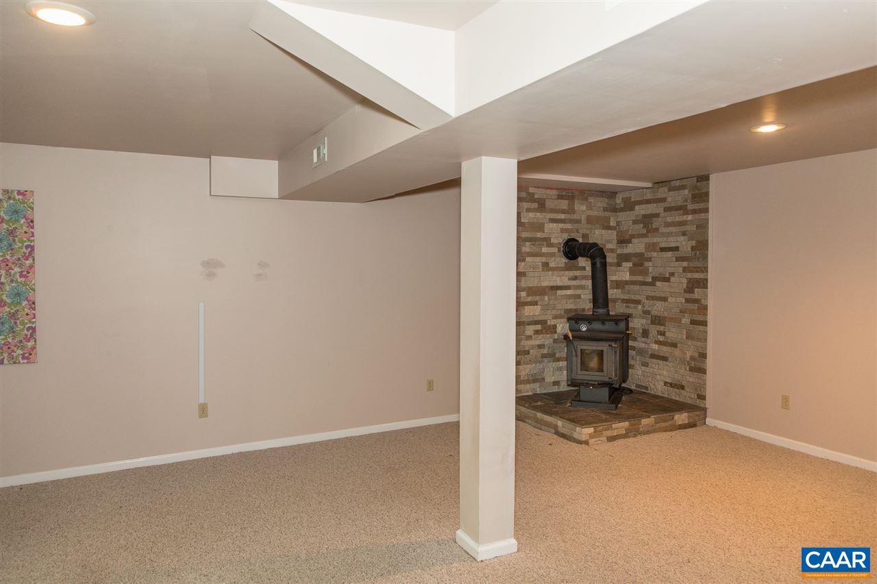 824 Dry Bridge Road Charlottesville, VA 22903 - Photo 29 of 43 a view of an empty room with a white wall