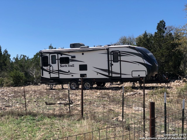 635 Rocksprings Tx 78880 Rocksprings, TX 78880 - Photo 10 of 17 a car parked on the side of a building