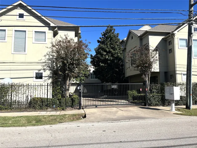 a view of a house with a street