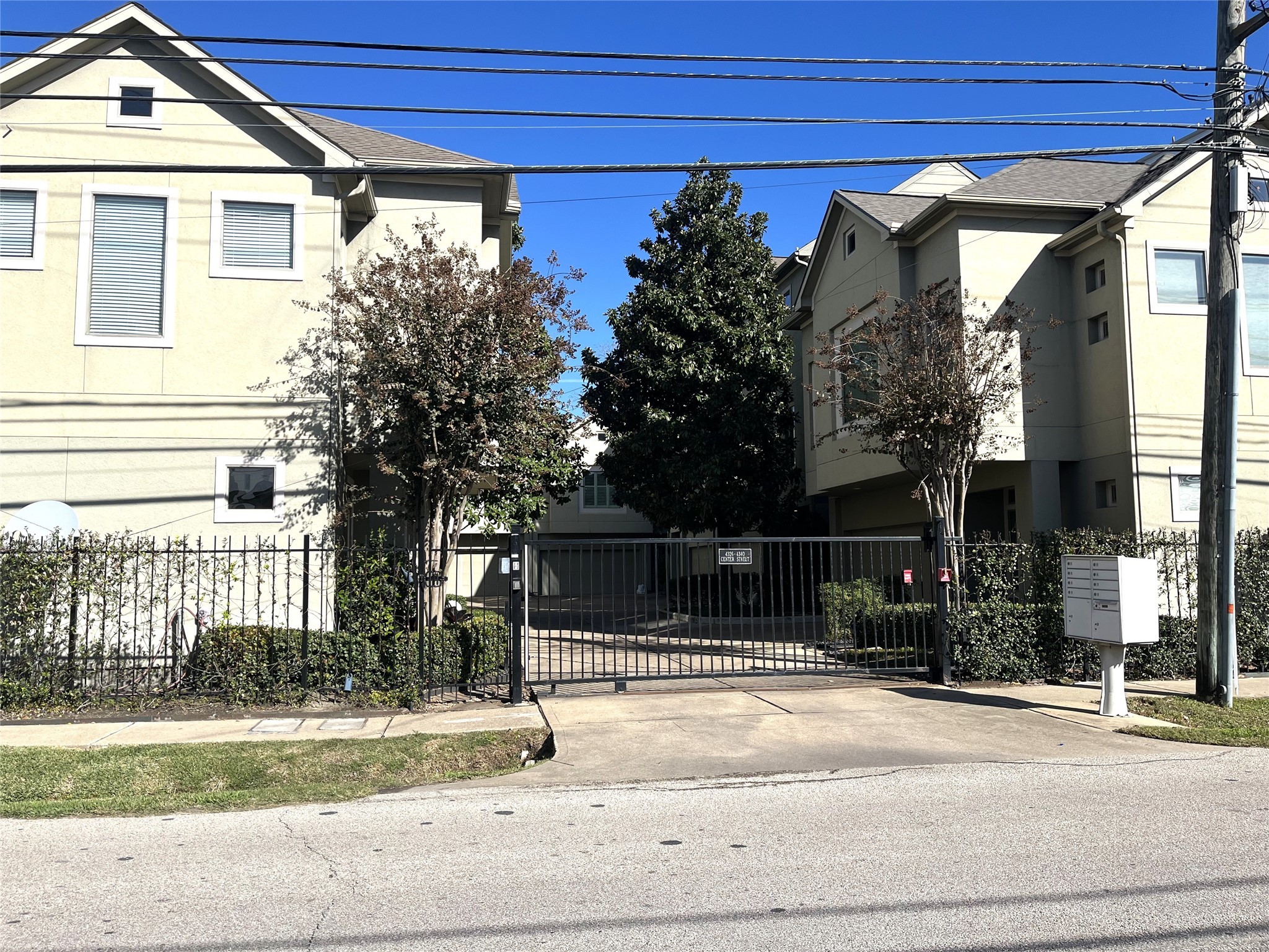 a view of a house with a street