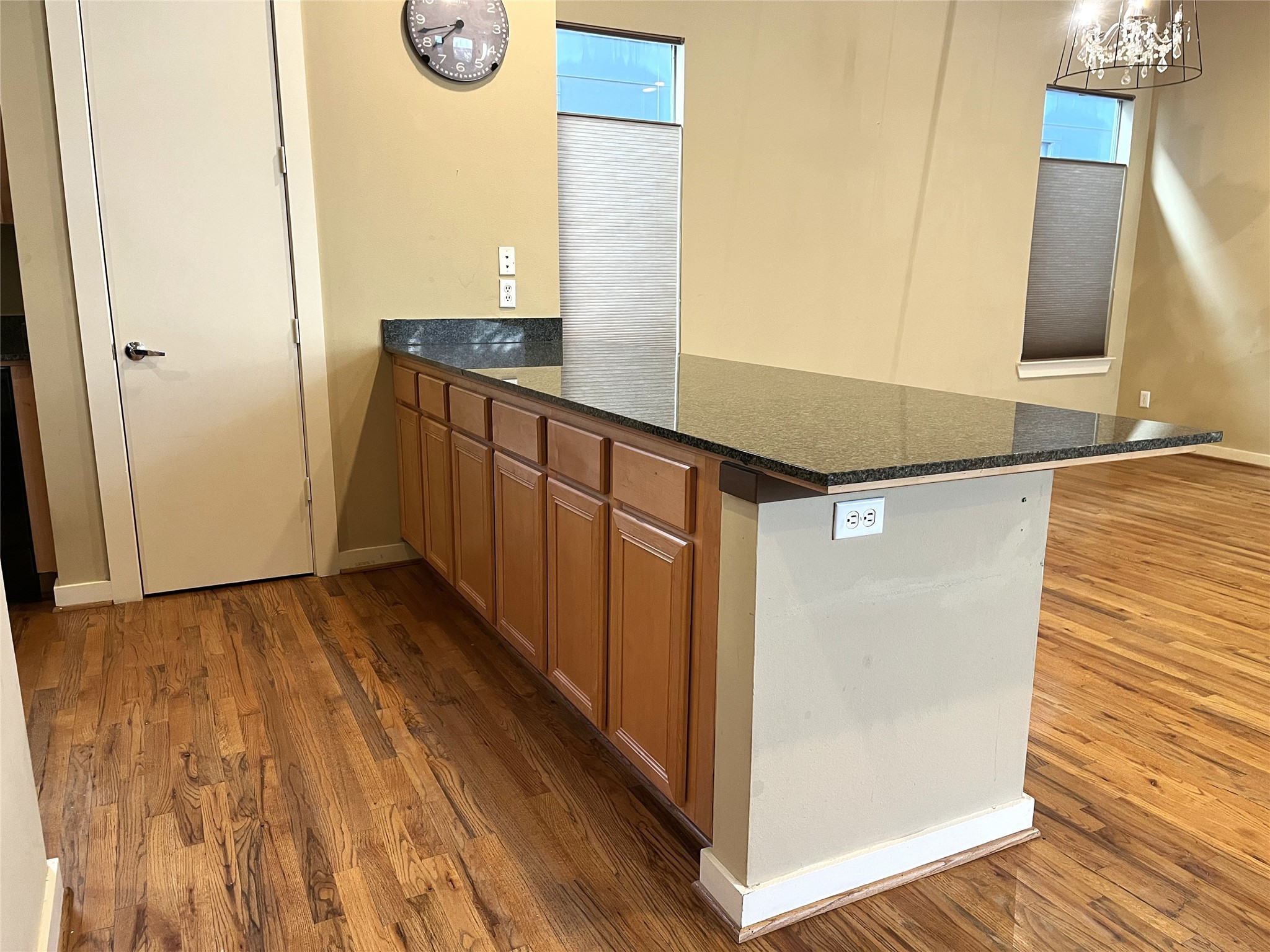 4338 Center Street Houston, TX 77007 - Photo 13 of 23 a view of a hallway with wooden floor and staircase