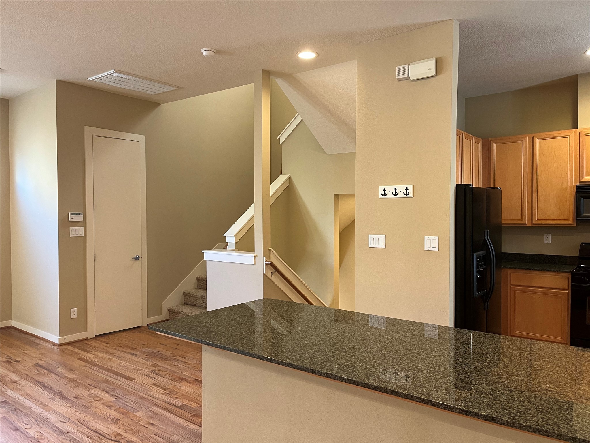 4338 Center Street Houston, TX 77007 - Photo 14 of 23 a view of a kitchen with a refrigerator and a stove