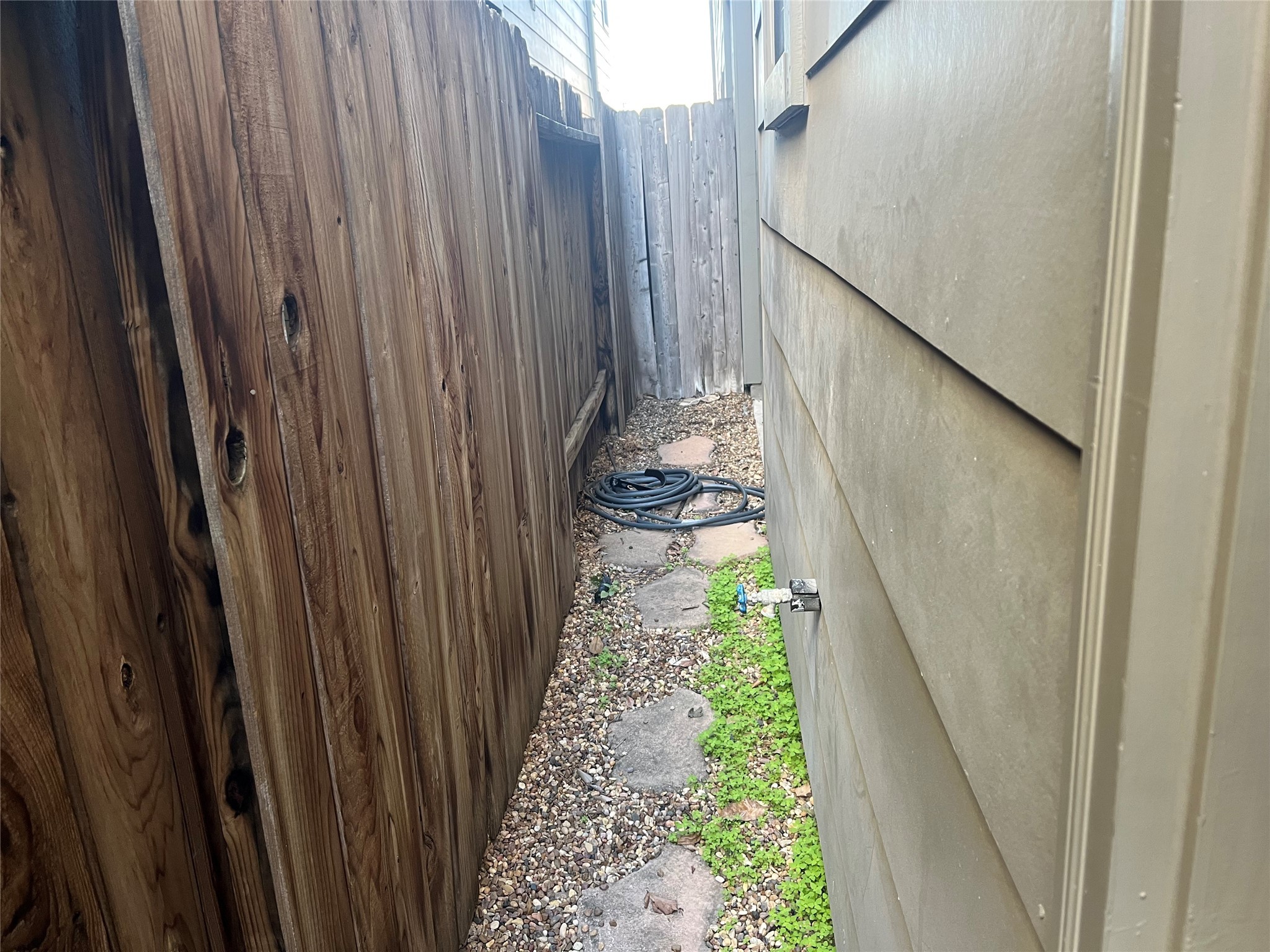 4338 Center Street Houston, TX 77007 - Photo 23 of 23 a view of a pathway with a wooden fence
