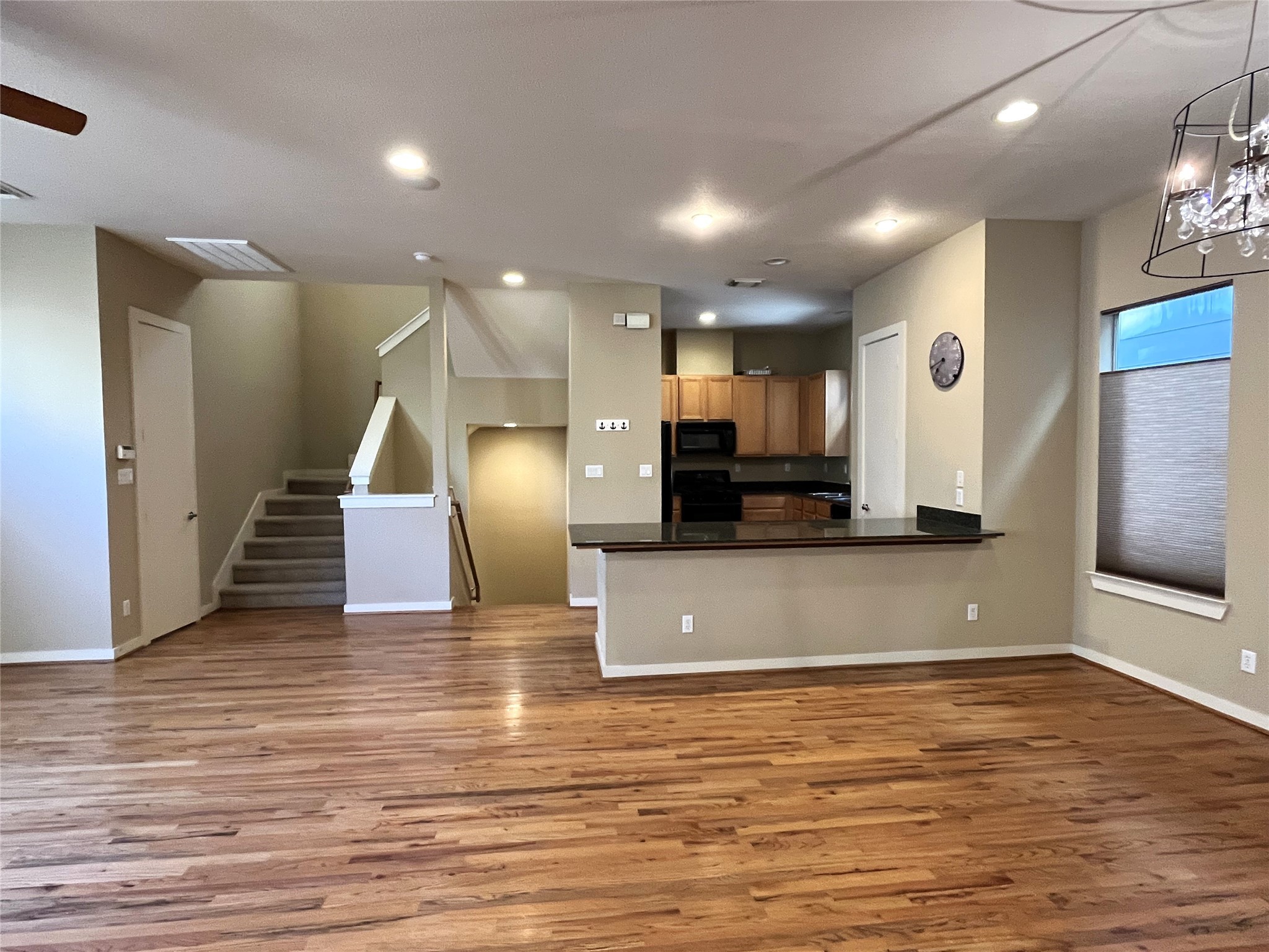 4338 Center Street Houston, TX 77007 - Photo 10 of 23 a view of a kitchen with cabinets and wooden floor