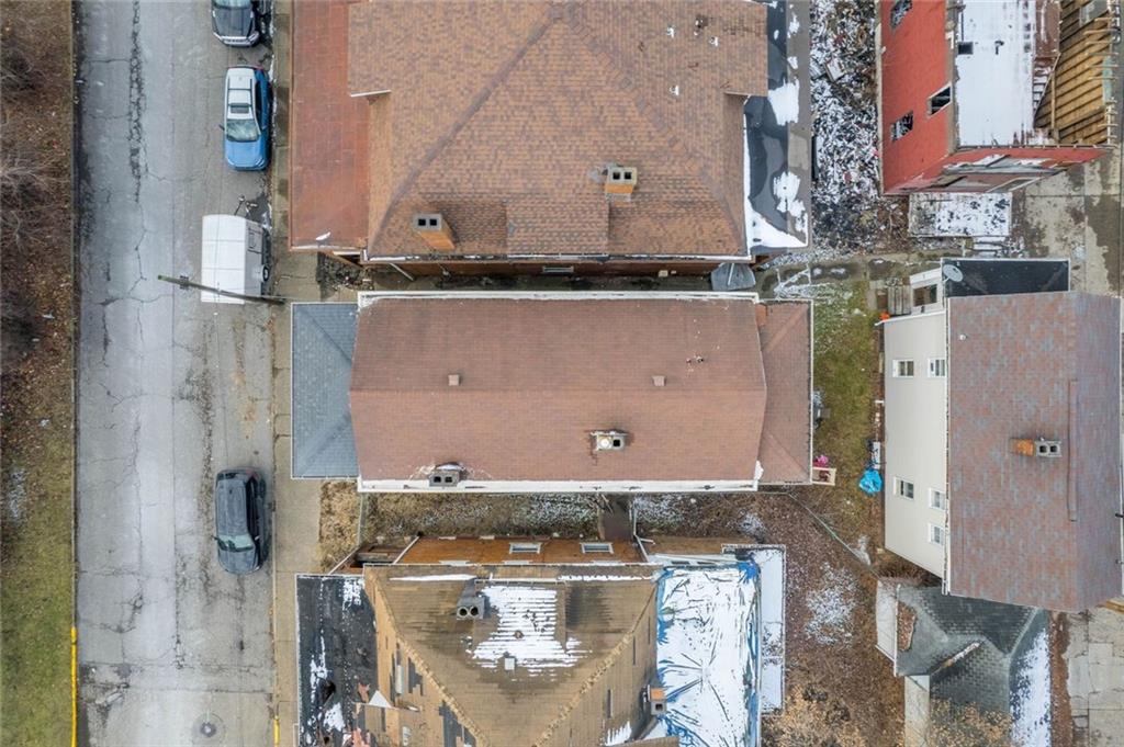 306 Park Road Ambridge, PA 15003 - Photo 21 of 43 an aerial view of residential houses with outdoor space and parking
