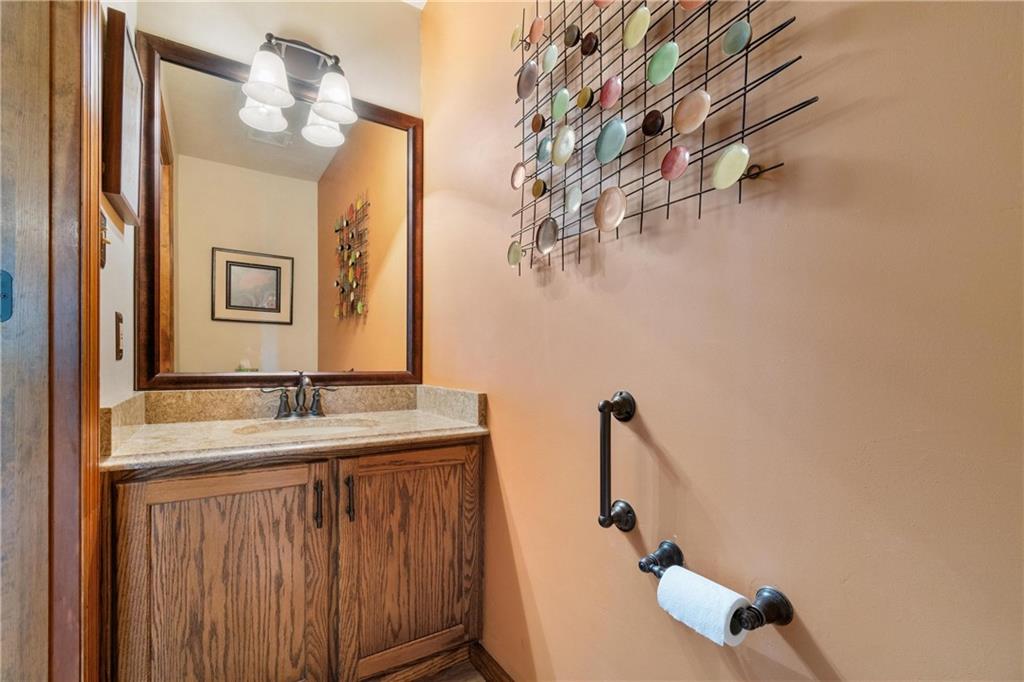 116 Firethorn Road Baden, PA 15005 - Photo 21 of 41 a bathroom with a granite countertop sink and a mirror