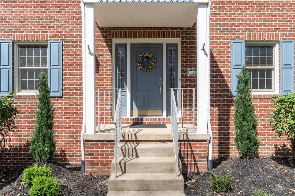 116 Firethorn Road Baden, PA 15005 - Photo 5 of 41 a front view of a house with a garden