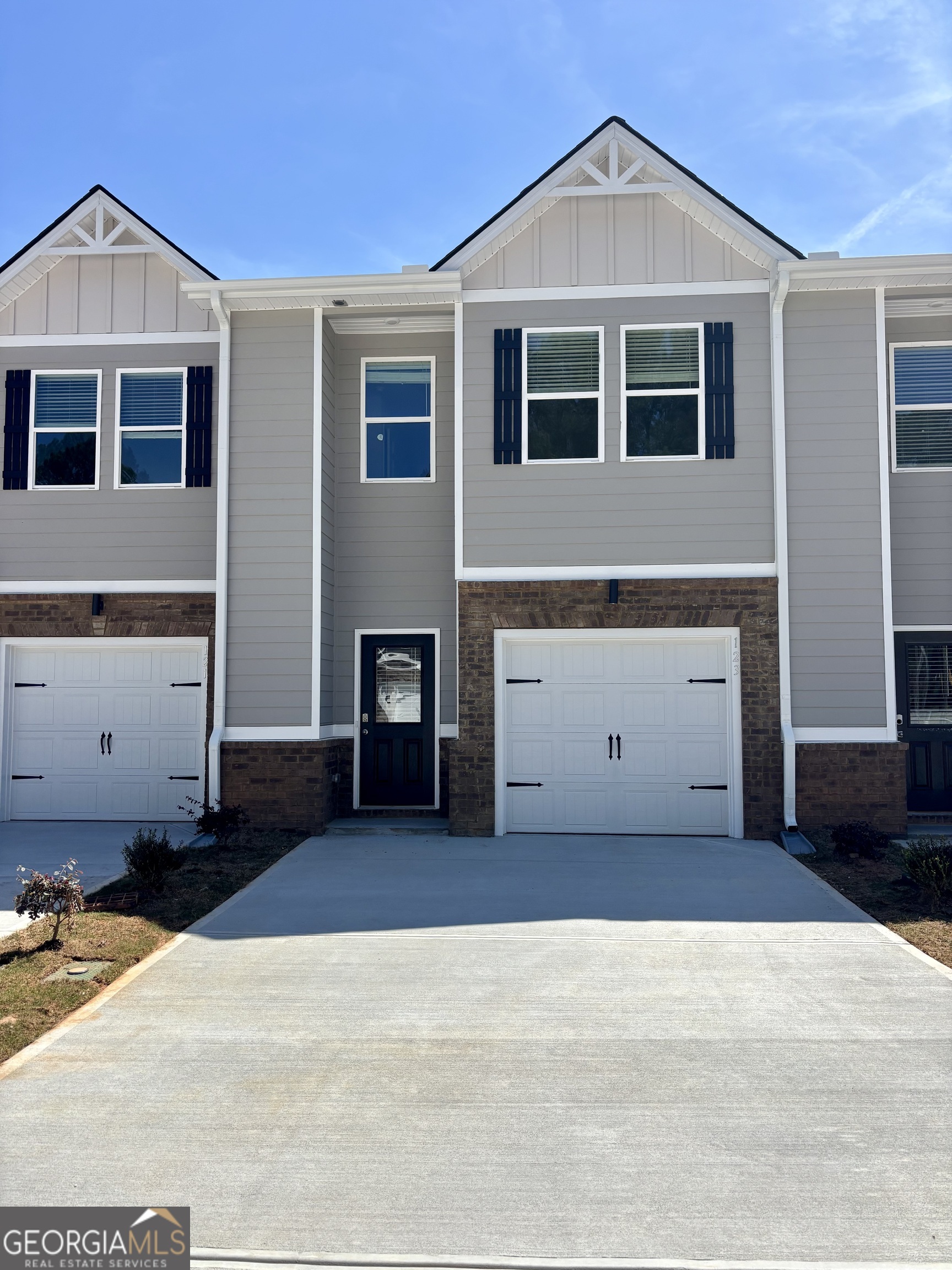 123 Meadowview Drive, Unit 15 Temple, GA 30179 - Photo 1 of 1 a front view of a house with a yard