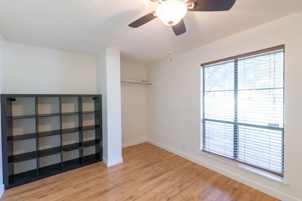 5310 Presidio Road Austin, TX 78745 - Photo 24 of 34 Bright, airy space features ample storage, a window, and durable flooring, ready for personalization.