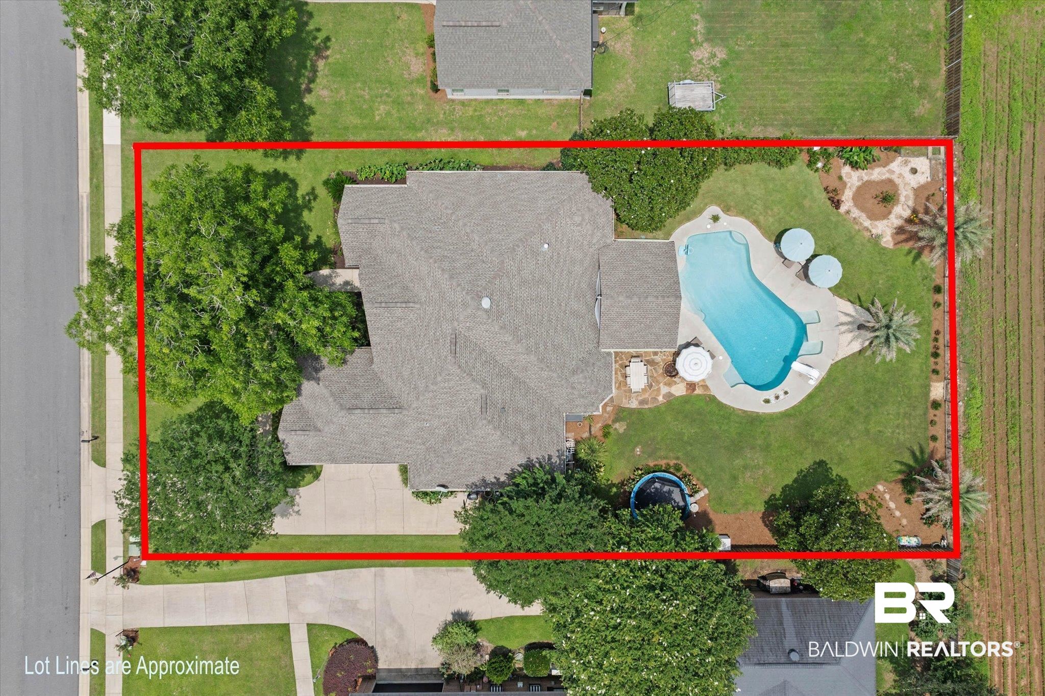 24908 Bosbyshell Avenue Daphne, AL 36526 - Photo 32 of 49 Aerial view of a residential property featuring a large, irregularly shaped swimming pool