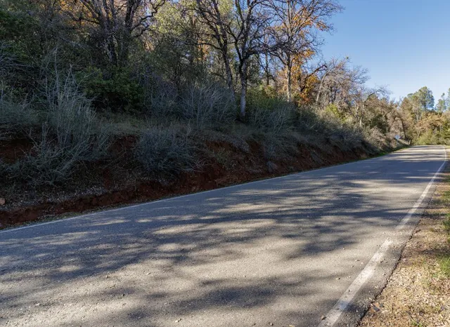 a view of a backyard of a house