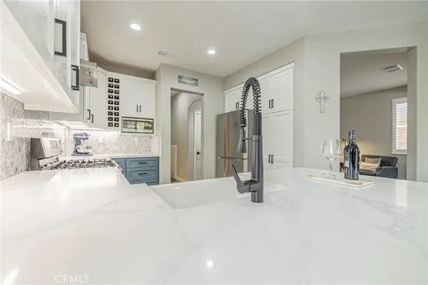 a view of a living room and entry way